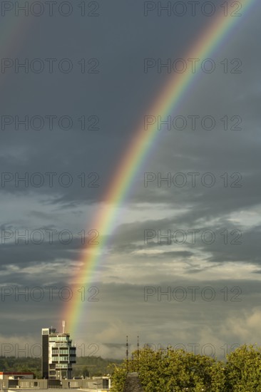Rainbow over the aquaTurm hotel in Radolfzell on Lake Constance, Constance district, Baden-Württemberg Germany