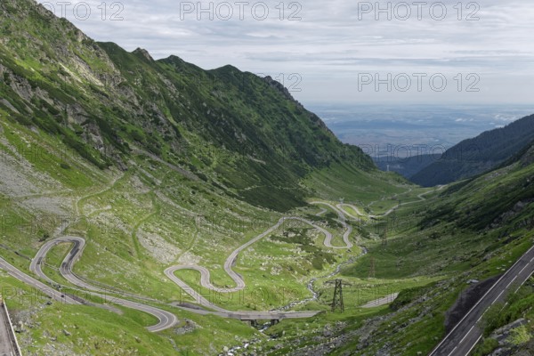 Serpentines in the course of the Transfagara, the Transfogaras High Road in the Fagaras Mountains, also Fogaras Mountains, in the mountain group of the Southern Carpathians. Sibiu, Romania, Southeast Europe, Europe