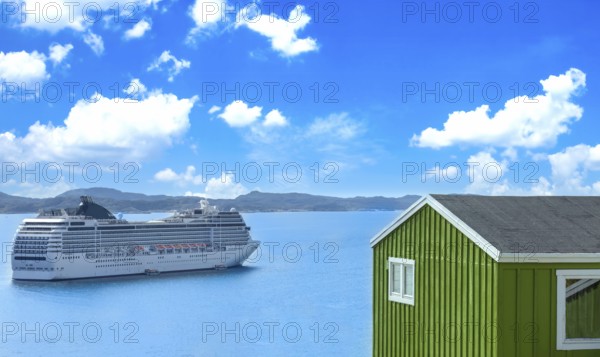 Cruise ship visit to Greenland city Qarqotoq with colored houses located near fjords and icebergs