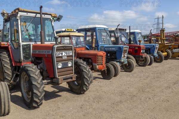 Old tractors lined up for sale at auction, Campsea Ashe, Suffolk, England, UK