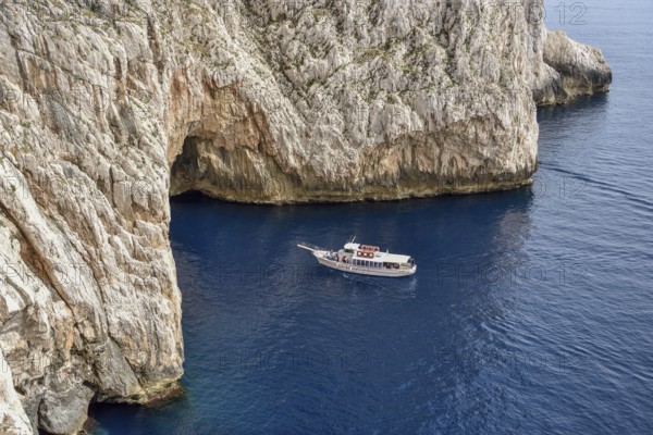 Tourboat at Neptune Grotto, Grotta di Nettuno, Parco Naturale Regionale di Porto Conto, near Alghero, Sardinia, Italy, Europe