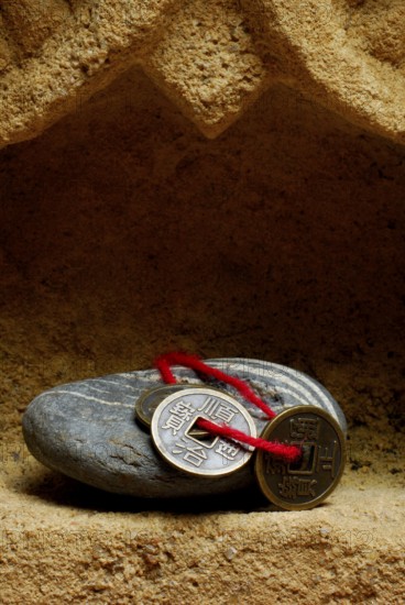 Stone and Chinese lucky coin, coins, lucky coins, lucky coin, coin
