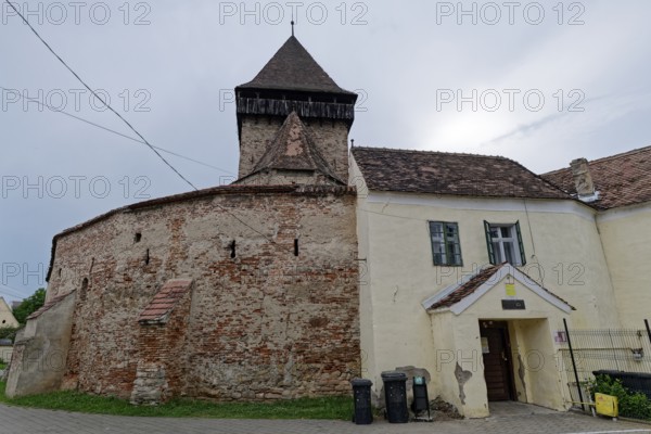 The fortified church of Frauendorf, Biserica Fortificata, in Transylvania. The church is a fortified church, which was surrounded by a wall like a fortress for defensive purposes. Frauendorf, Transylvania, Transylvania, Romania, Southeast Europe, Europe