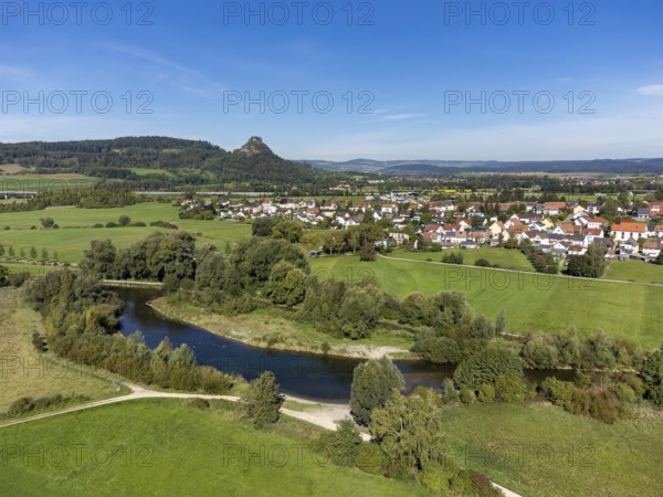 The Radolfzeller Aach with the village of Hausen an der Aach, on the horizon the Hegau volcano Hohenkrähen, Constance district, Baden-Württemberg, Germany, Europe