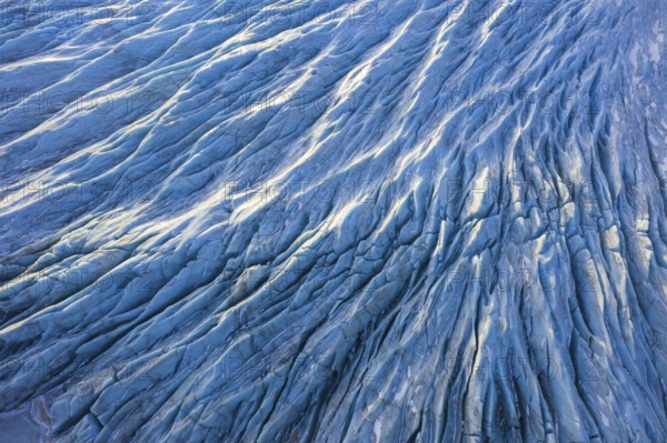 Aerial view over ice tongue Falljökull in winter, one of many outlet glaciers of Vatnajökull, Vatna Glacier, largest ice cap in Iceland, Austurland