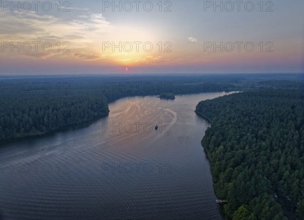 Aerial view of Lake Rospuda in the evening light in northern Poland. Augustow, Podlaskie, Poland, Europe