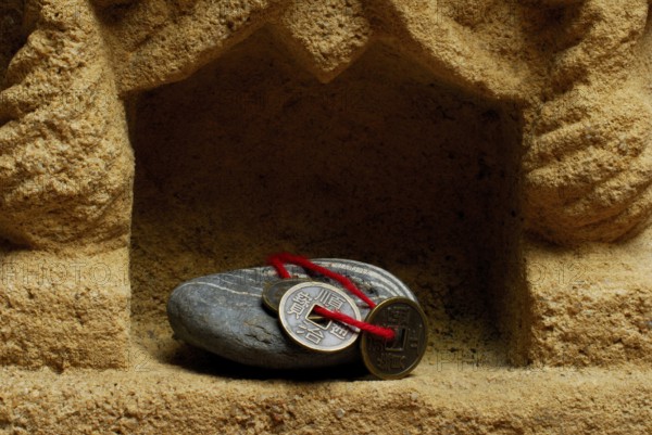 Stone and Chinese lucky coin, coins, lucky coins, lucky coin, coin