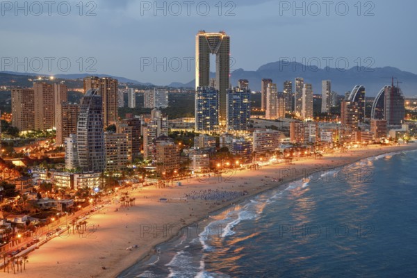 Skyline of Benidorm with the high-rise Intempo, with 192 metres the highest residential building in Europe, blue hour, Playa Poniente, Benidorm, Costa Blanca, Valencia County, Spain, Europe