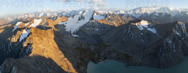 Evening mood, mountain panorama, aerial view, 4000 metre peak with glacier, mountain pass and mountain lake Ala-Kul Lake, Tien Shan, Kyrgyzstan, Asia