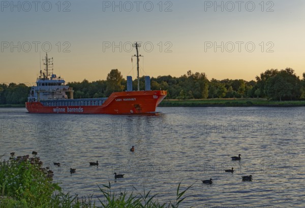 Shipping traffic in the evening on the Kiel Canal. Breiholz, Schleswig-Holstein, Germany, Europe