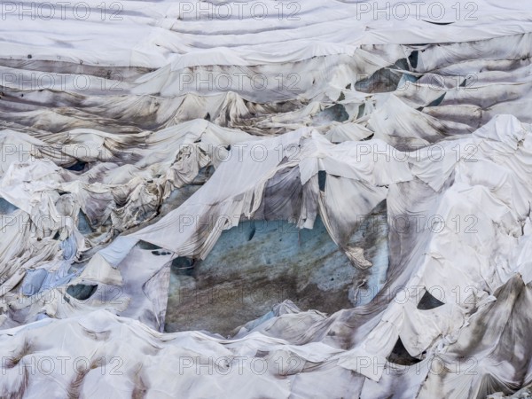 Rhone glacier covered with sheets to protect the ice from melting above the glacier cave, Belvedere, Switzerland, Europe