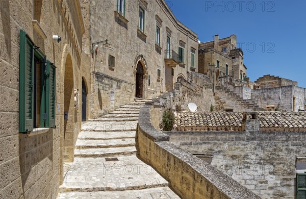 Paths and corridors in the tuff of the Sassi Barisano in the cave town of Matera. The cave settlements, Sassi, are a UNESCO World Heritage Site. Matera, Basilicata, Southern Italy, Southern Europe