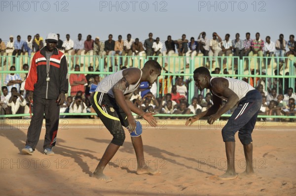 Nuba fighting, Nuba Wrestling, Haj Yusef district, Kharthoum, Sudan, Africa