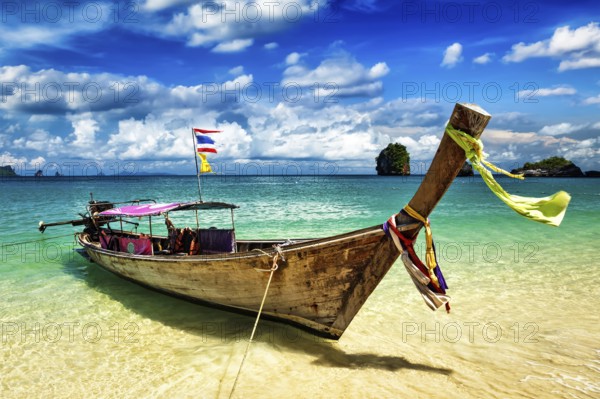 Long tail boat on tropical beach, Krabi, Thailand, Asia