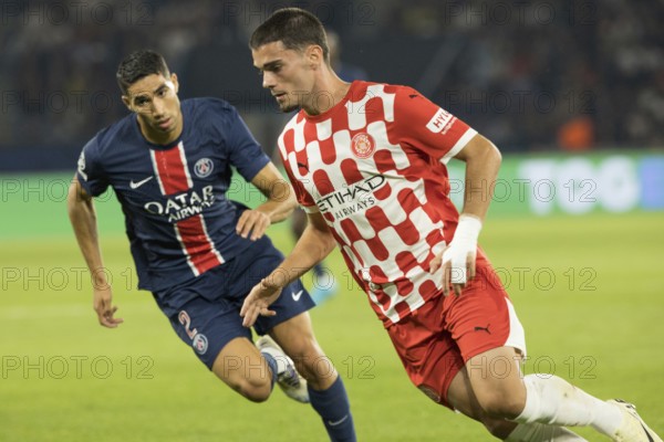 Football match, Achram HAKIMI Paris St. Germain in a duel with Miguel GUTIERREZ Girona FC, Parc des Princes football stadium, Paris
