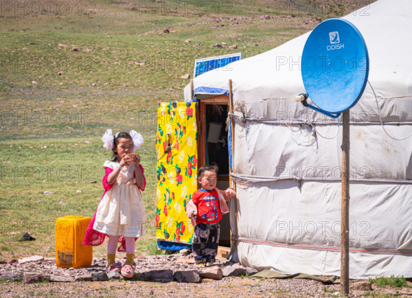 Nomad kids out of yurt looking at me. Summer time in Gobi-Altai province8 Mongolia