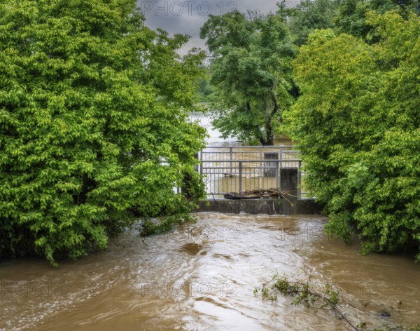 Landscape with a flooded bridge after heavy rain in Schrobenhausen