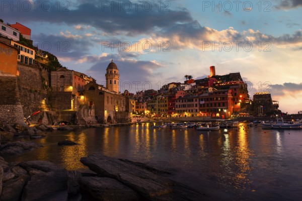 Vernazza, small italian town on the seashore at sunset