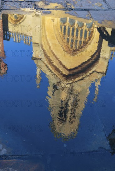 YORK, NORTH YORKSHIRE/UK - FEBRUARY 20 : Reflection of St Helen Stonegate church in a puddle in York, North Yorkshire on February 20, 2020