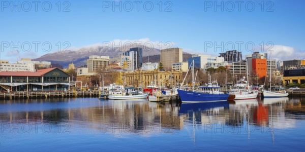 HOBART, TASMANIA, SEPTEMBER 13: View towards Mt Wellington over Constitution Dock and CBD area in Hobart, Tasmania, Australia on September 13th 2022