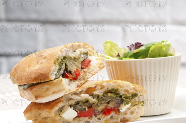 Italian ciabatta panini sandwichwith with vegetable and feta cheese