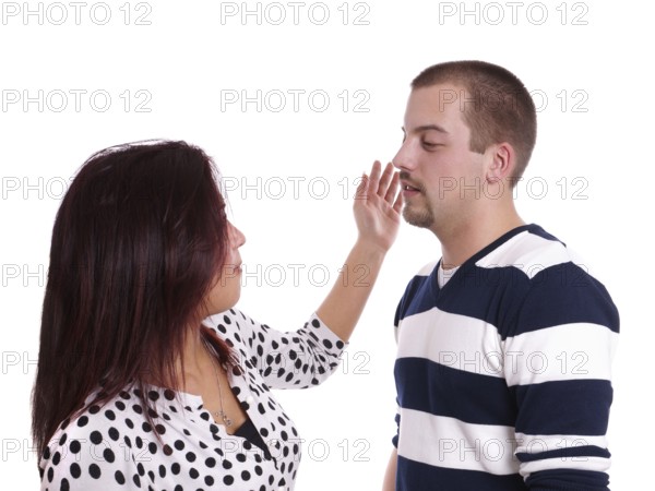 young woman bitch slapping a young man