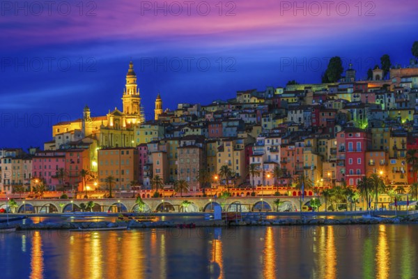 Old town architecture of Menton on French Riviera by night