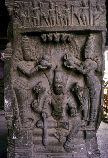 Vishnu with hi consorts Sridevi and Bhudevi sculpture in Ramaswamy temple pillared Mahamandapatam in Kumbakonam, Tamil Nadu, India, Asia
