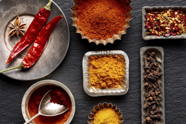 Assortment spices with clove chili peppers