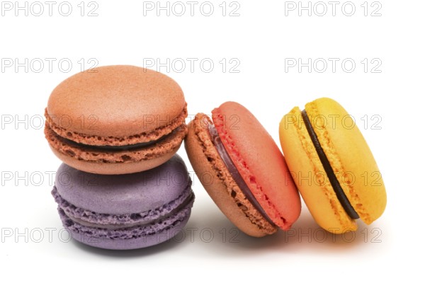 Colorful fresh macarons isolated on white background