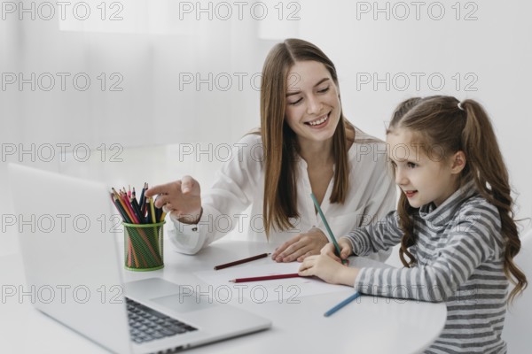 Teacher student learning together. High resolution photo
