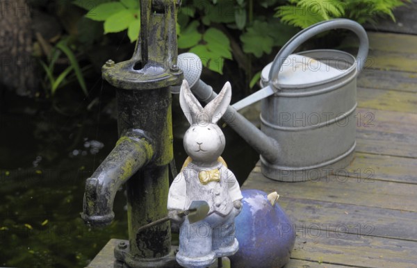 Rabbit figure by the garden, fountain