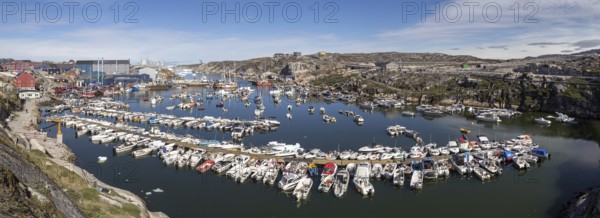 Ilulissat, Greenland, July 03, 2018: Panoramic view of the harbor in Ilulissat, North America