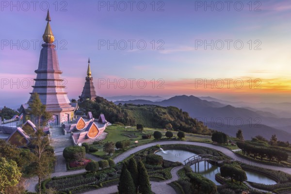 Noppamethanedol and Noppapol Phumsiri pagoda and picturesque sunset sky. Doi Inthanon national park, Thailand, Asia