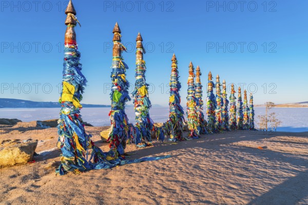 Shaman totem poles at Cape Burkhan on Olkhon Island in Lake Baikal, Russia, Europe