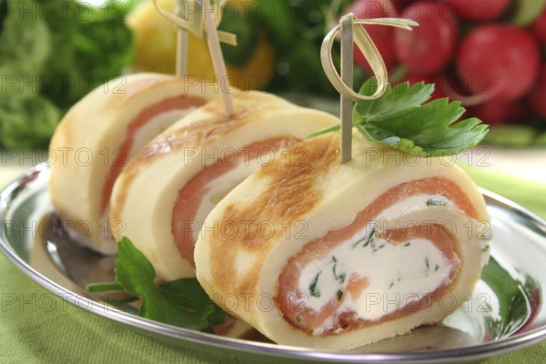 Pancakes filled with smoked salmon and cream cheese