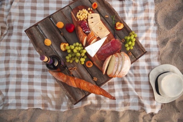 Summer picnic on the beach. Top view. Picnic