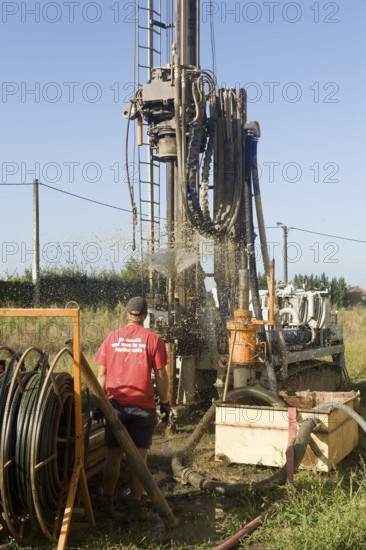 Geothermal drilling, construction site, geothermal energy, for heat pump, house construction, Belgium, Europe