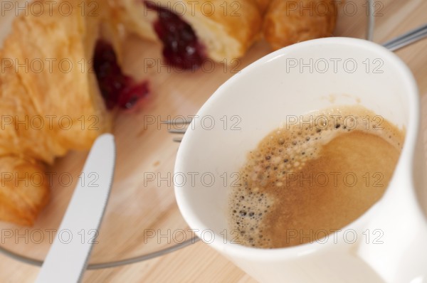 Fresh croissant french brioche and coffee typical traditional Italian breakfast