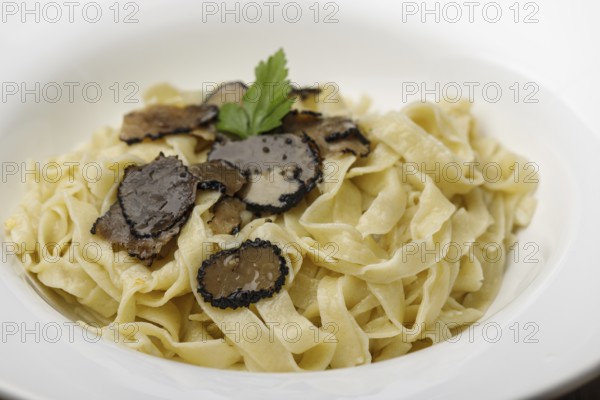 Black truffle on homemade pasta