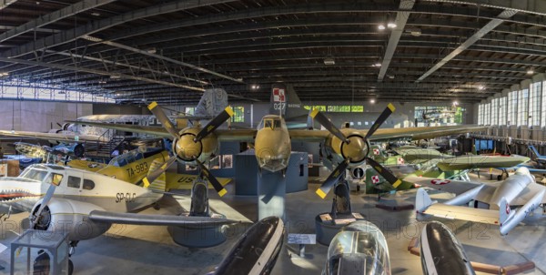 A panorama picture of the main hangar of the Polish Aviation Museum, focused on the Tupolev Tu-2S