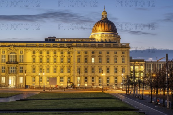 The imposing reconstructed city palace in the heart of Berlin at sunrise