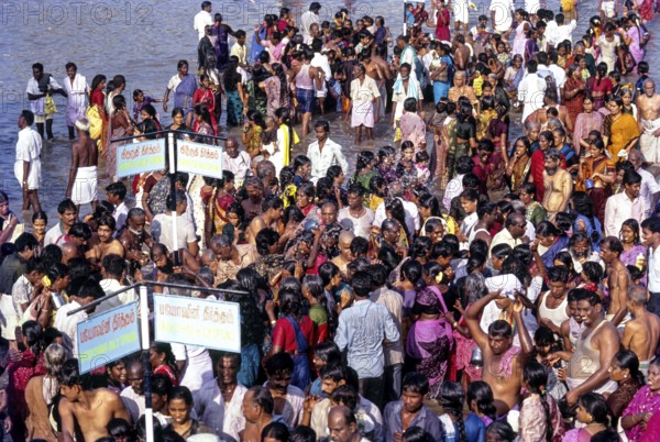 People gathered to take a dip in biodhini and Kruruthi theerthams (sacrad water) during Mahamakham festival in Kumbakonam, Tamil Nadu, India, Asia