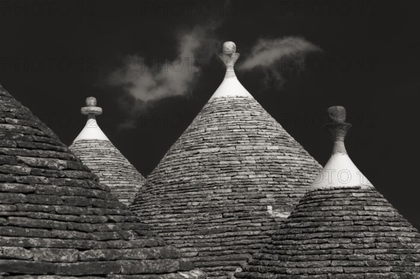 Roofs of typical trullo houses (trulli) in Apulia, Italy, Europe