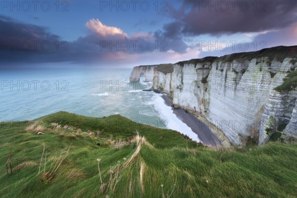 Sunrise over coast rocks, Etretat, France, Europe