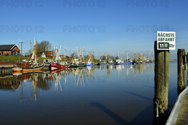 Fishing boat in Greetsiel cutter harbour, Krummhörn, East Frisia, Lower Saxony