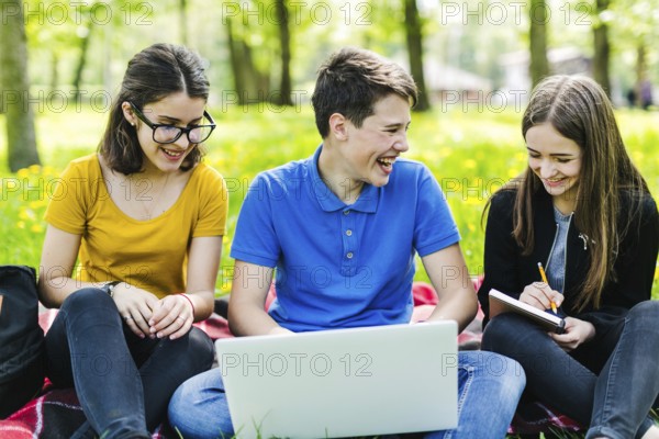 Friends having fun studying