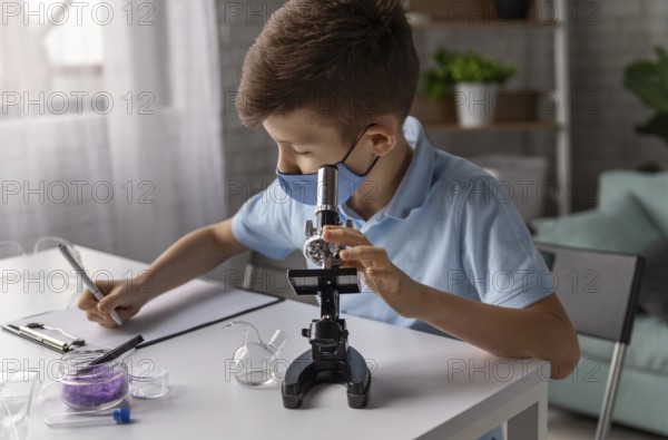 Medium shot kid learning with microscope
