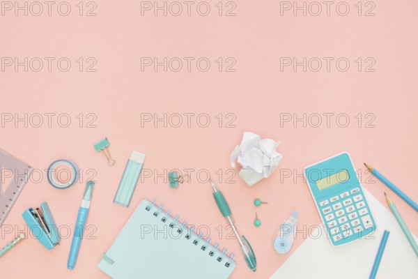 Top view office stationery with notebook calculator