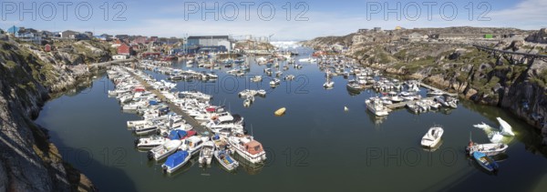 Ilulissat, Greenland, July 03, 2018: Panoramic view of the harbor in Ilulissat, North America